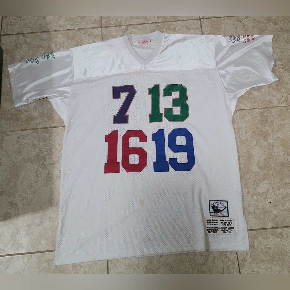 Mitchell & Ness Quarterbacks of the Century football jersey.